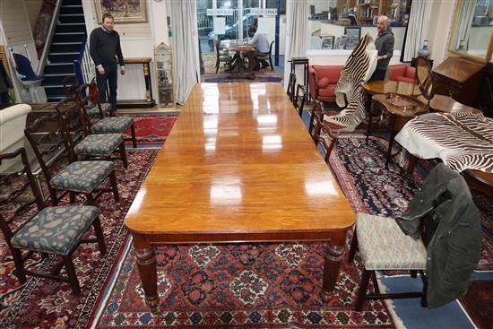 A late Victorian mahogany extending dining table on fine fluted tapered legs. 400cm extended